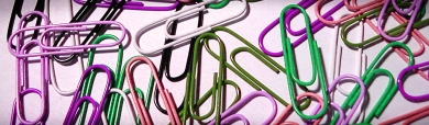 colored-office-paper-clips-background-header